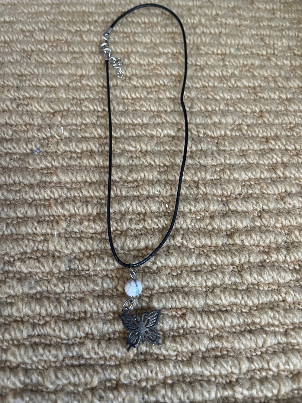 Butterfly Pendant Necklace with White Bead on Black Cord
